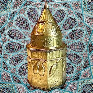 Antique brass canister made in India.